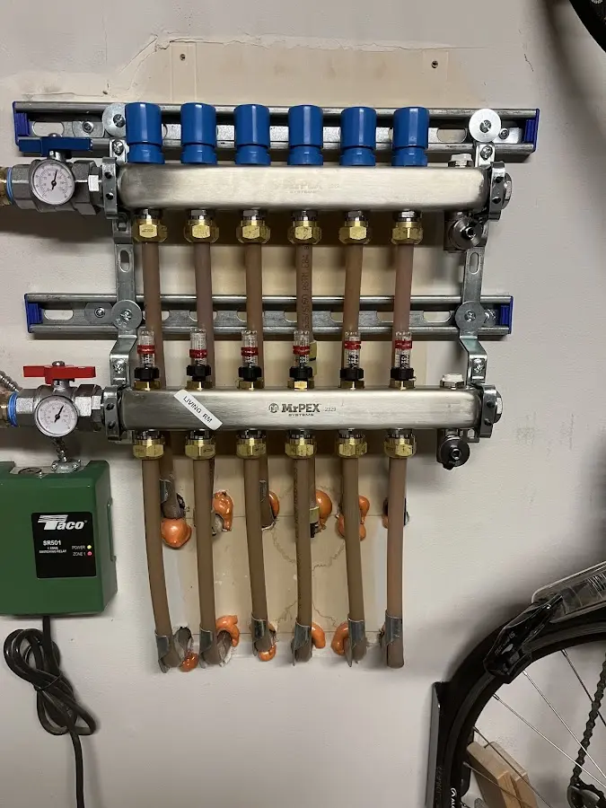 Plumber performing Gas Leak Detection at a residential property in Gibsonville